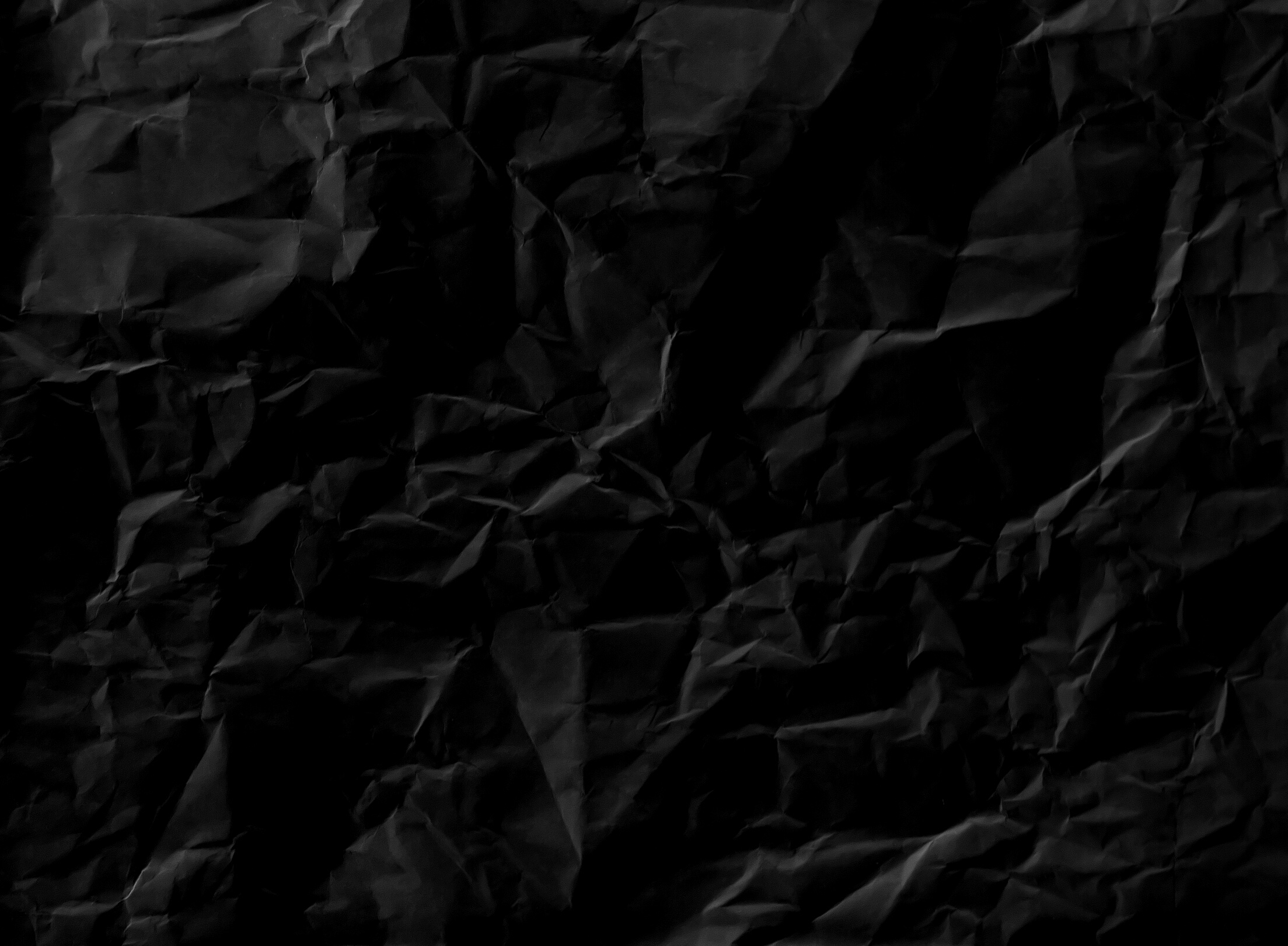 Dark Crumpled Paper Texture Background